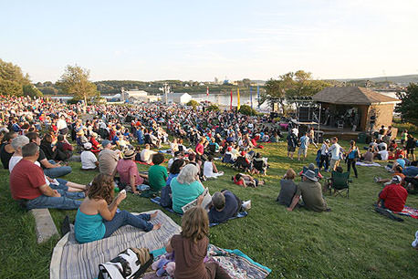 Large crowd of people enjoying the music